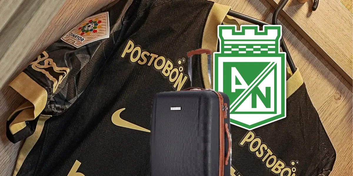 Un jugador de Atlético Nacional se despide en el campo, con una atmósfera de cambio en el horizonte.